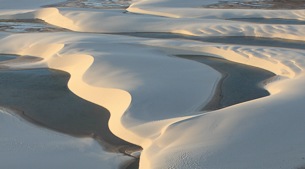 Towering sand-dunes and freshwater lagoons